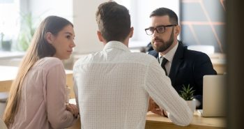 Mortgage broker listening to clients